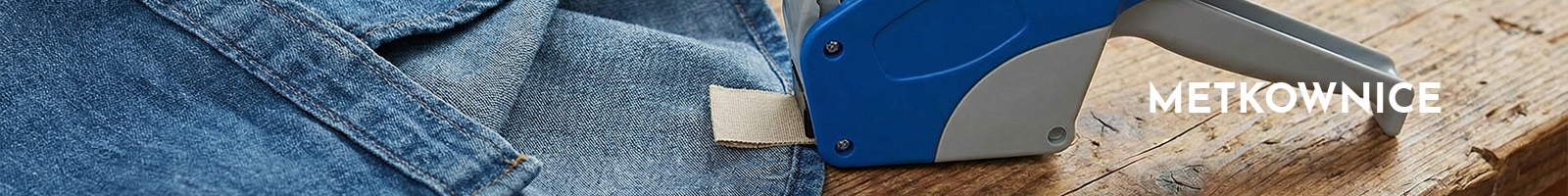 a label machine next to cloths